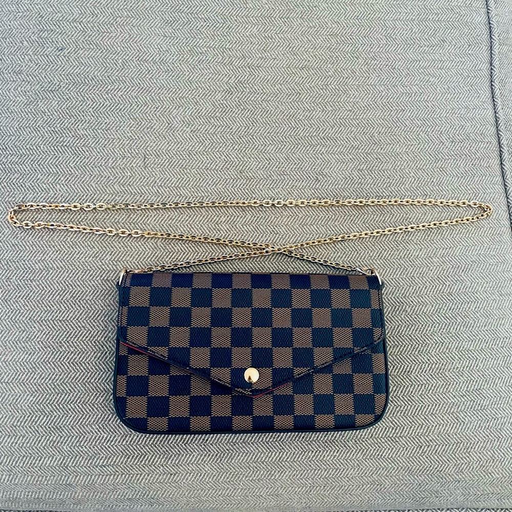 LV style crossbody bag.